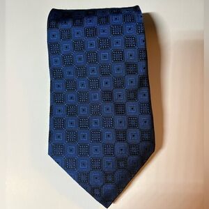 Ferrell Reef  Boulder Tradng Group men silk necktie
Blue and Black Square (110)